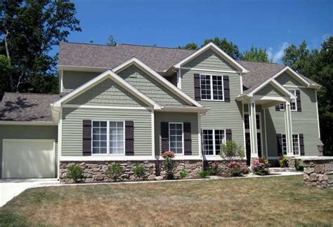 sage green house with metal roof|sage siding on house.